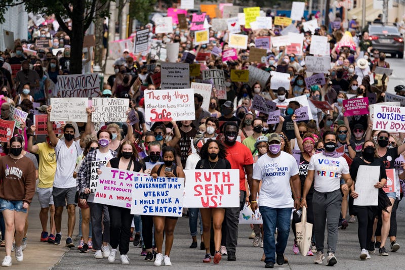 Demonstrators rally in support of women's reproductive rights on October 2, 2021 in Atlanta, Georgia. The Women's March and other groups organized marches across the country to protest the new abortion law in Texas.