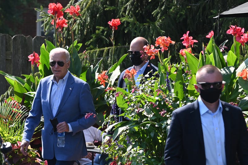 US President Joe Biden departs Brew Haha!, a coffee shop he ate at in Wilmington, Delaware on October 3, 2021, after leaving church.