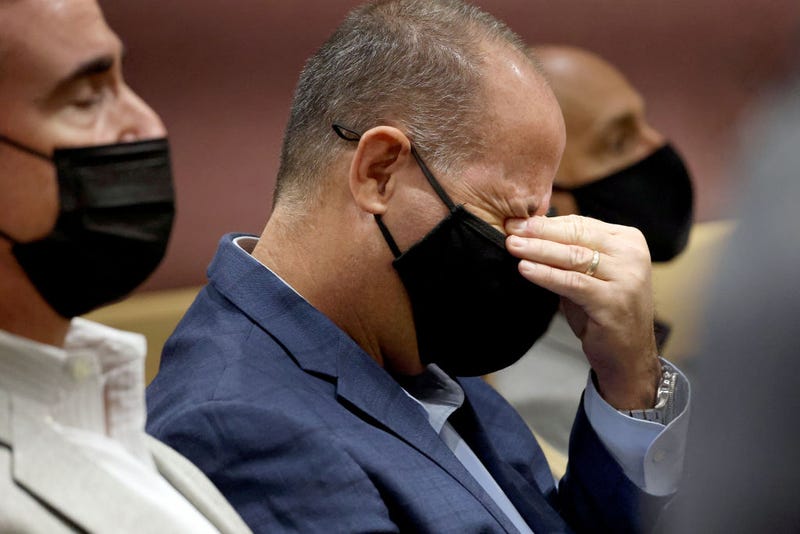 Fred Guttenberg wipes his eyes as Marjory Stoneman Douglas High School shooter Nikolas Cruz pleads guilty at the Broward County Courthouse on October 20, 2021 in Fort Lauderdale, Florida. Cruz pleaded guilty to all 17 counts of premeditated murder and 17 counts of attempted murder in the 2018 shooting in Parkland, Florida. Guttenbergs daughter, Jaime Guttenberg, 14, and Hoyers son, Luke Hoyer, 15, were both killed in the massacre. (Photo by Amy Beth Bennett-Pool/Getty Images)