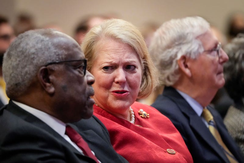 Associate Supreme Court Justice Clarence Thomas sits with his wife and conservative activist Virginia Thomas while he waits to speak at the Heritage Foundation on October 21, 2021 in Washington, DC. Clarence Thomas has now served on the Supreme Court for 30 years. He was nominated by former President George H. W. Bush in 1991 and is the second African-American to serve on the high court, following Justice Thurgood Marshall. 