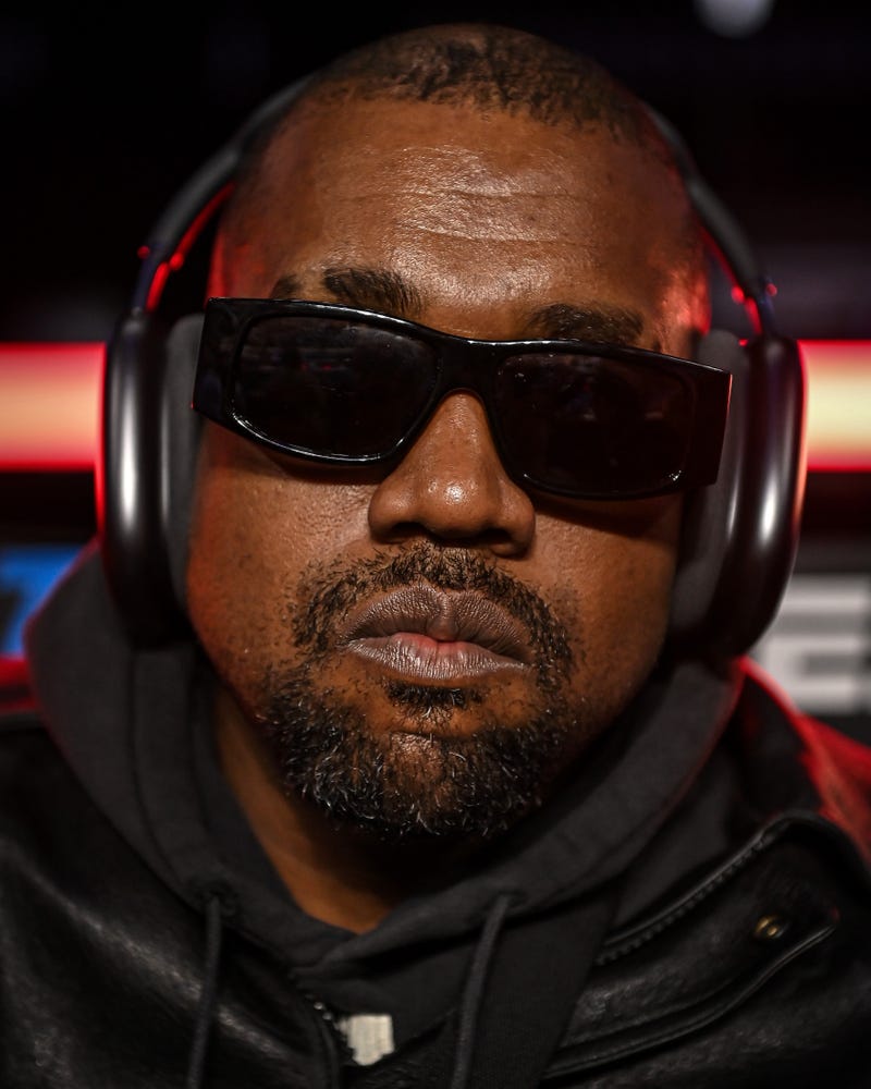 Ye poses for a photo as he arrives for the fight between Jamel Herring and Shakur Stevenson at State Farm Arena on October 23, 2021 in Atlanta, Georgia.