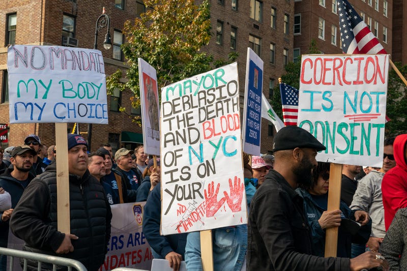 People protest the Covid-19 vaccine mandate for municipal workers during a protest at Gracie Mansion on October 28, 2021 in New York City