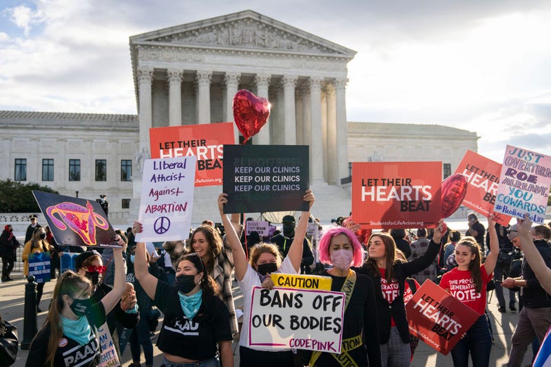 Pro-choice and anti-abortion demonstrators rally outside the U.S. Supreme Court on November 01, 2021 in Washington, DC. On Monday, the Supreme Court is hearing arguments in a challenge to the controversial Texas abortion law which bans abortions after 6 weeks. (Photo by Drew Angerer/Getty Images)