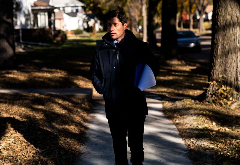 Minneapolis mayor Jacob Frey walks a neighborhood as he campaigns on Election Day on November 2, 2021 in Minneapolis, Minnesota.