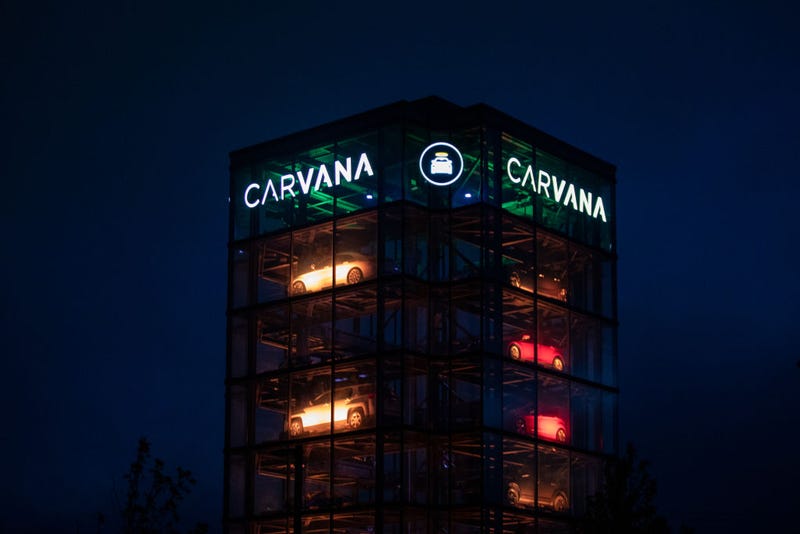 Signage outside a Carvana Vending Machine location in in Novi, Michigan on Sunday, Oct. 31, 2021.