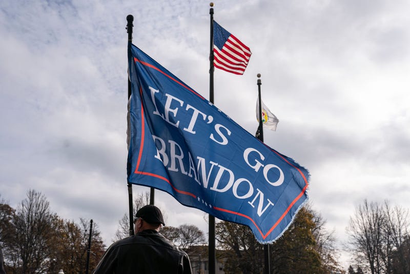  A supporter of Kyle Rittenhouse flies a Lets Go Brandon flag in front of the Kenosha County Courthouse while the jury deliberates the Rittenhouse trial on November 16, 2021 in Kenosha, Wisconsin. 