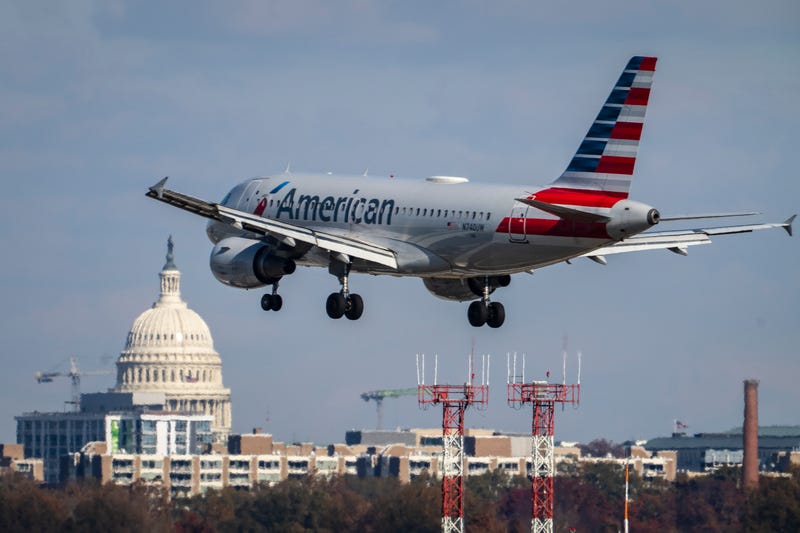 An American Airlines plane lands at Ronald Reagan Washington National Airport November 23, 2021 in Arlington, Virginia.