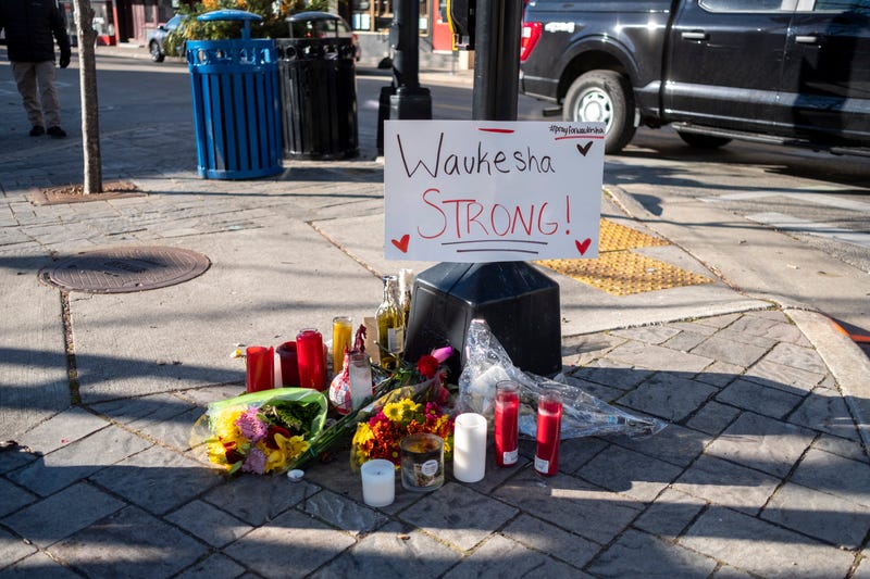 Memorials placed along Main Street in downtown Waukesha Wisconsin left in areas where people were hit by a driver plowing into the Christmas parade on Main Street in downtown November 22, 2021 in Waukesha, Wisconsin.