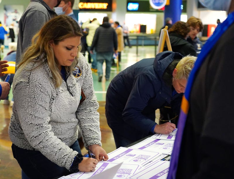 People taking part in Giving Tuesday