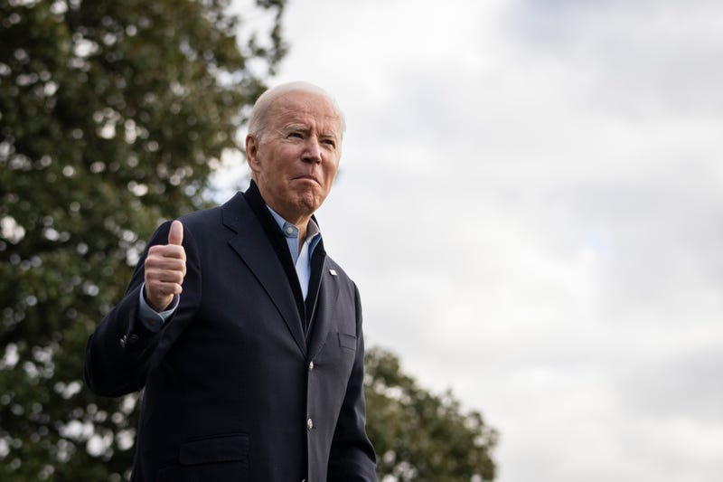 U.S. President Joe Biden gives a thumbs up after speaking to reporters as he walks to Marine One on the South Lawn of the White House December 15, 2021 in Washington, DC.
