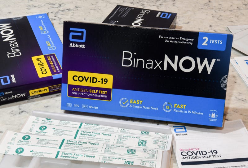 Abbott's at-home covid-19 rapid test kits are seen on display in Orlando.