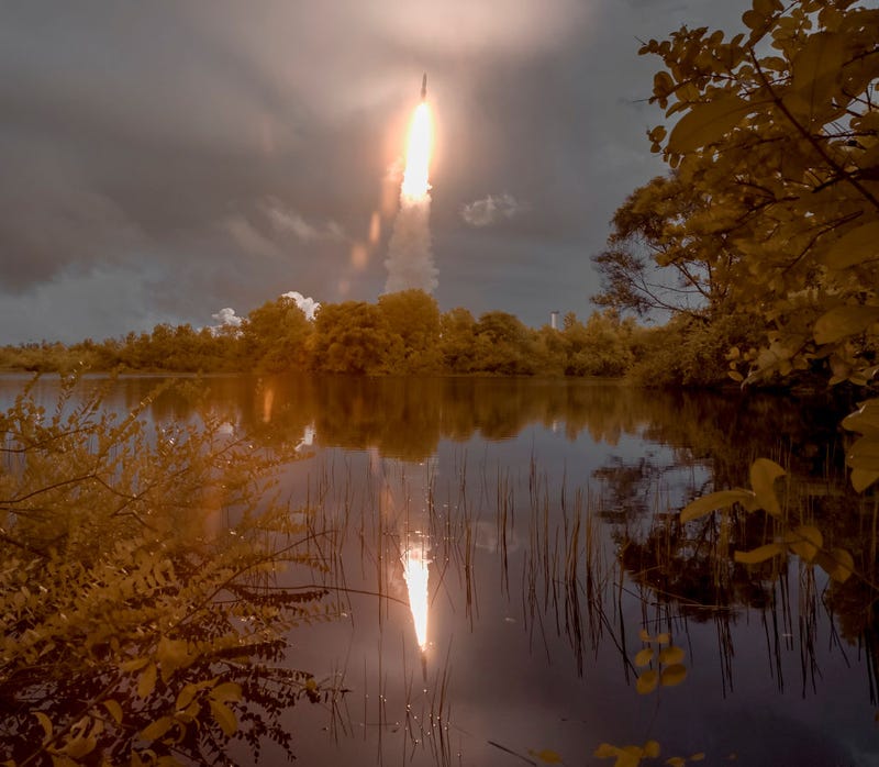 In this handout image provided by the U.S. National Aeronatics and Space Administration (NASA), Arianespace's Ariane 5 rocket launches with NASA's James Webb Space Telescope onboard, from the ELA-3 Launch Zone of Europes Spaceport at the Guiana Space Centre at Europes Spaceport, at the Guiana Space Center on December 25, 2021, in Kourou, French Guiana. The James Webb Space Telescope (sometimes called JWST or Webb) is a large infrared telescope with a 21.3 foot (6.5 meter) primary mirror. The observatory will study every phase of cosmic history from within our solar system to the most distant observable galaxies in the early universe. (Photo by Bill Ingalls/NASA via Getty Images)