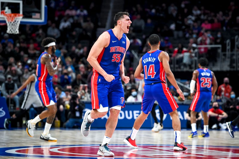Luka Garza #55 of the Detroit Pistons reacts against the San Antonio Spurs during the second quarter at Little Caesars Arena on January 01, 2022 in Detroit, Michigan.