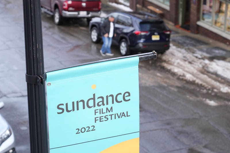 A man gets out of his car on Old Main Street where filmgoers would have gathered for the 2022 Sundance Film Festival on Jan. 6, 2022, in Park City Utah.