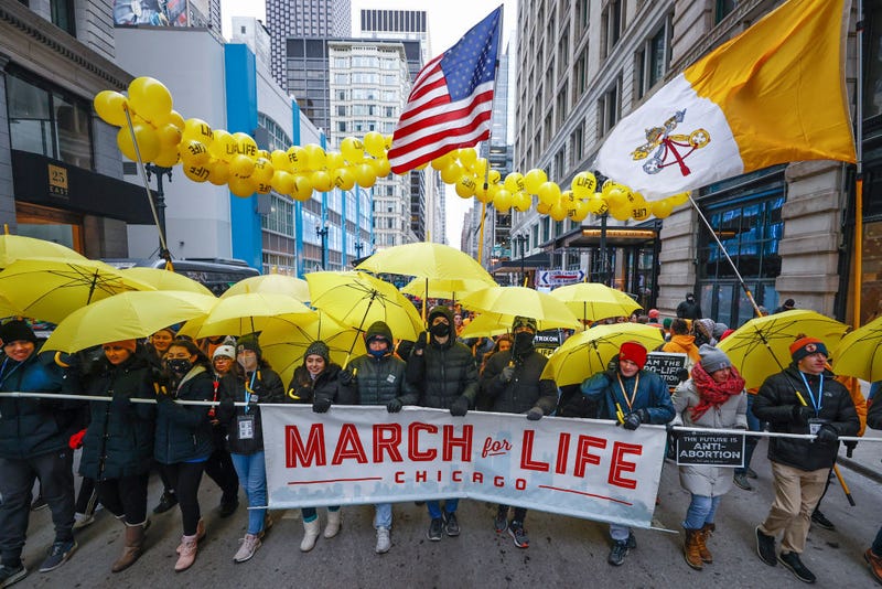 Pro-life advocates walk during the March For Life on January 8, 2022 in Chicago, Illinois. Rally and march were a part of three day annual public event
