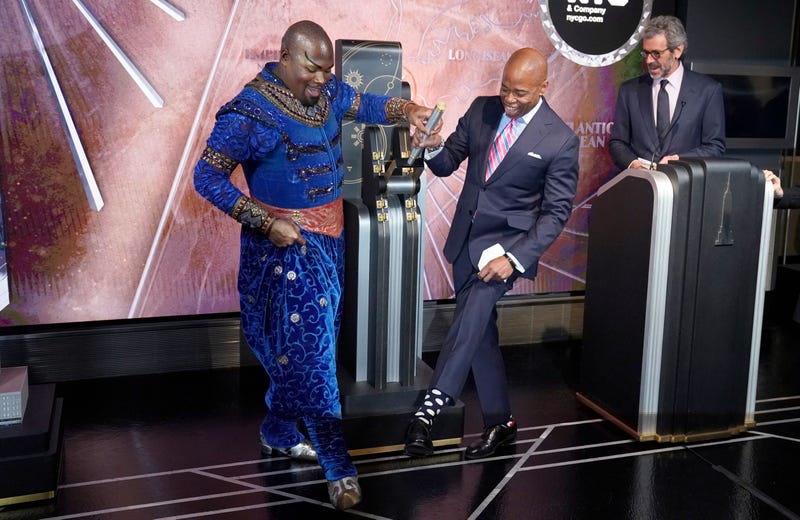 New York City Mayor Eric Adams and Michael James Scott participate in a ceremonial lighting of the Empire State Building in New York on January 18, 2022 to launch 'winter outing' initiative.