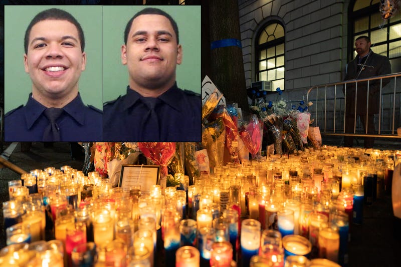 A candlelight vigil was held at the 32nd Precinct stationhouse in Harlem on Jan. 24, 2022. Inset: Officers Jason Rivera and Wilbert Mora