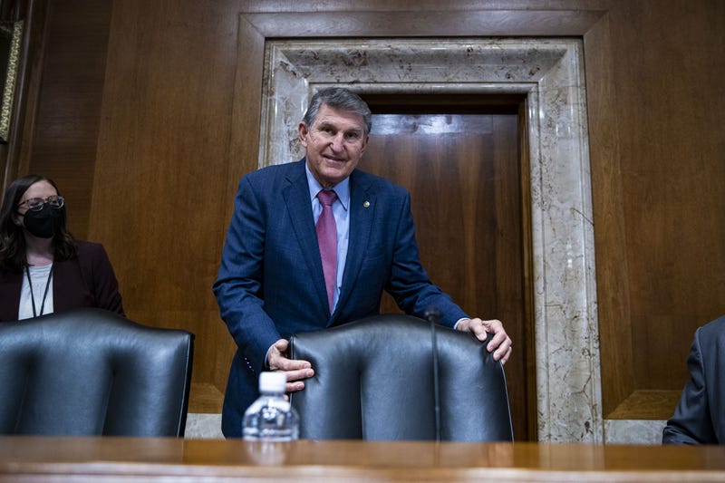 Senator Joe Manchin, a Democrat from West Virginia and chairman of the Senate Energy and Natural Resources Committee, arrives during a hearing in Washington, D.C., U.S., on Tuesday, Feb. 1, 2022. Senators negotiating a sanctions package intended to deter a Russian invasion of Ukraine said they're optimistic they'll resolve lingering disagreements and strike a deal this week.
