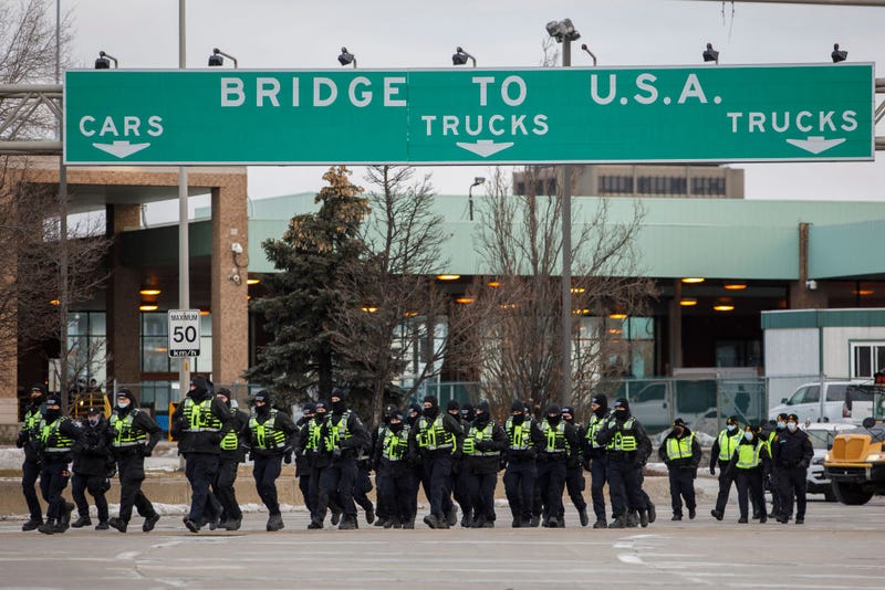 The Ambassador Bridge is expected to reopen between 11 a.m. and noon on Saturday after Canadian police moved in on protestors who have blocked access to the bridge since Monday night.