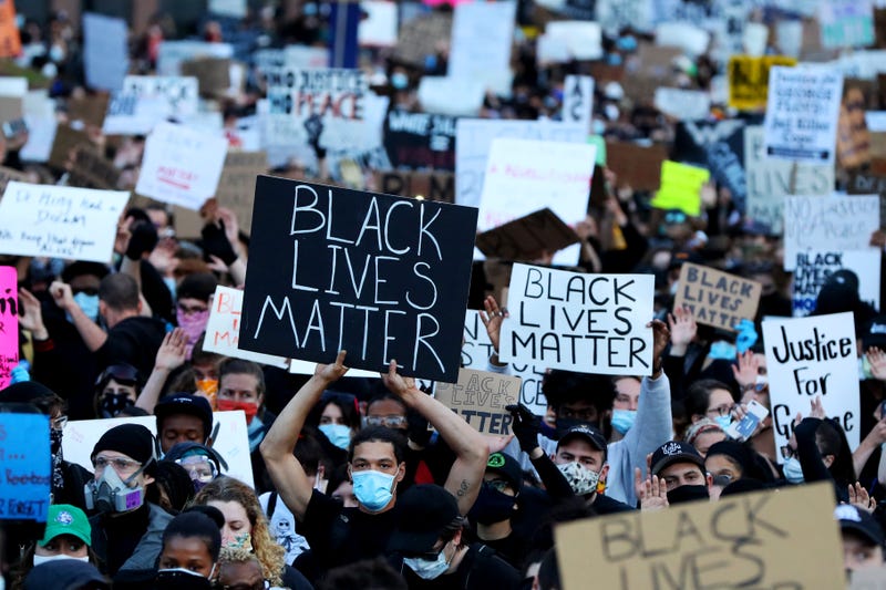 Demonstrators protest in response to the recent death of George Floyd on May 31, 2020 in Boston, Massachusetts.