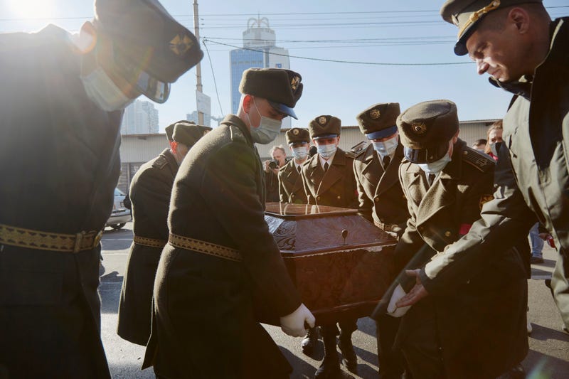 Members of the Kyiv Presidential Honor Guard Battalion carry the coffin of Captain Anton Olegovich Sidorov to the Saint Trinity Cathedral on February 22, 2022 in Kyiv, Ukraine. The soldier's death was reported by Ukraine's army on Saturday, one of the first such casualties in weeks, attributing it to a fatal shrapnel wound amid a wave of shelling by separatist rebels in the east