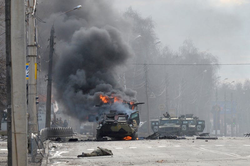 KHARKIV, UKRAINE - FEBRUARY 27: A Russian Armoured personnel carrier (APC) burning during fight with the Ukrainian armed forces in Kharkiv.