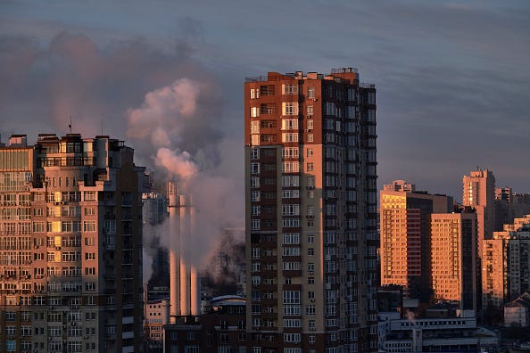 A view of Kyiv during a curfew in the early morning with steam from a heating plant on February 28, 2022 in Kyiv, Ukraine.