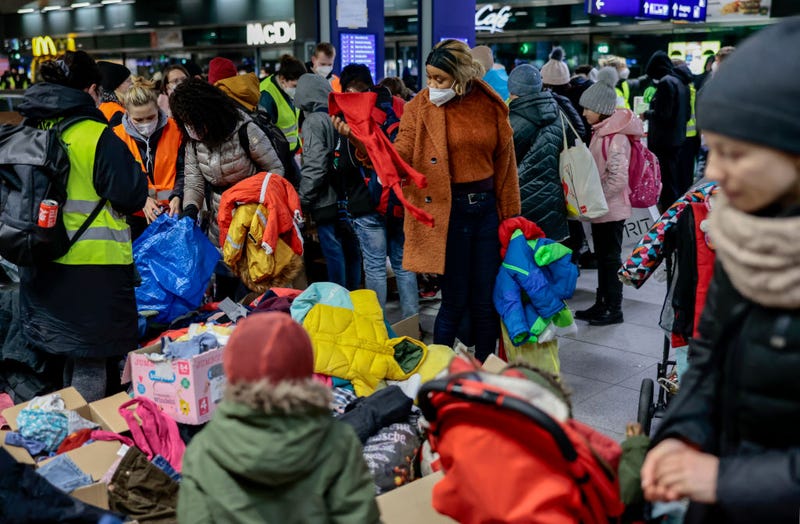 People fleeing Ukraine get food, clothing, and toiletries at Hauptbahnhof main railway station in Berlin, Germany.