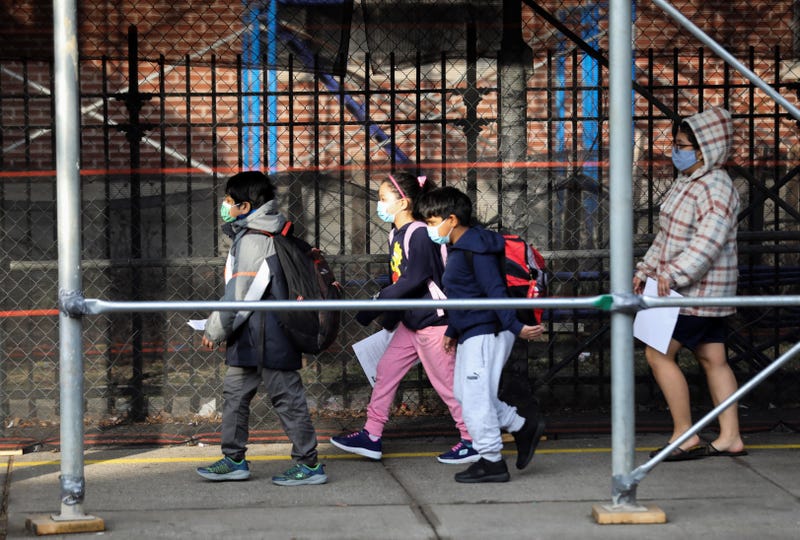 New York state is recommending children wear masks again while indoors at school as a "tripledemic" looms this winter