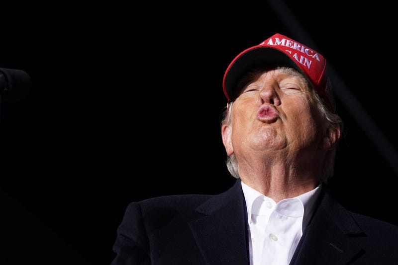  Former US President Donald Trump blows a kiss to the crowd during a rally at the Florence Regional Airport on March 12, 2022 in Florence, South Carolina. Todays visit by Trump is his first rally in South Carolina since his election loss in 2020. (Photo by Sean Rayford/Getty Images)