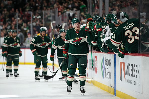 Matt Boldy #12 of the Minnesota Wild celebrates his goal.