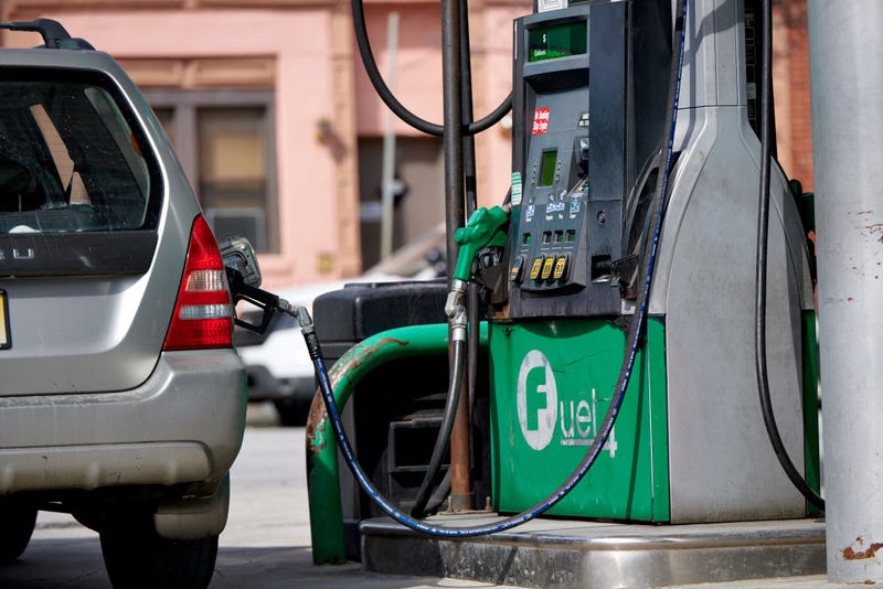 A vehicle at a fuel pump in Jersey City