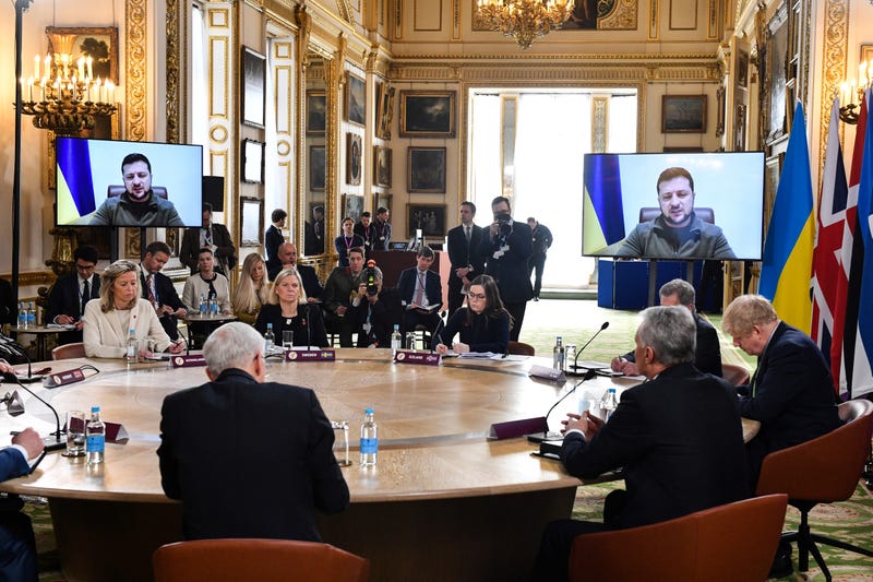 Ukraine's President Volodymyr Zelensky addresses by video link attendees attending a meeting of the leaders of the Joint Expeditionary Force (JEF) at Lancaster House on March 15, 2022 in London, United Kingdom