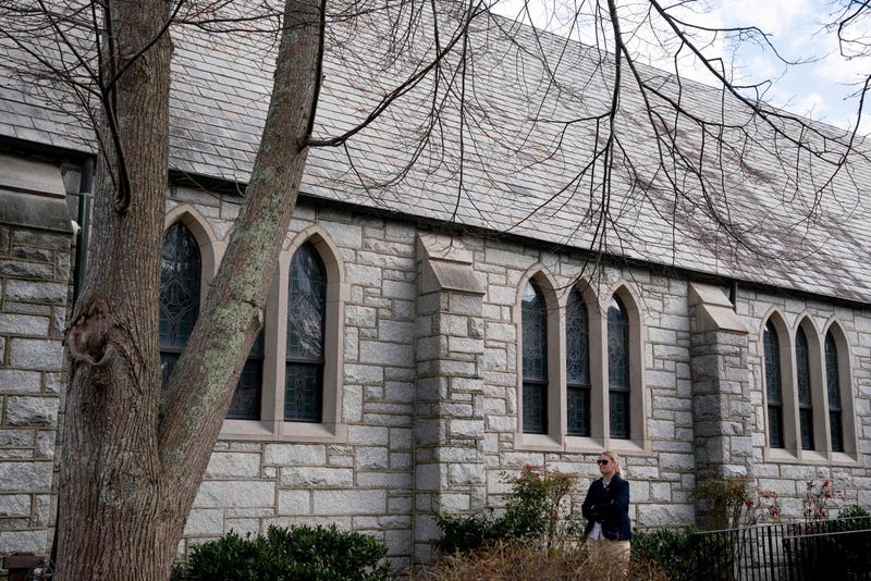A Secret Service agent stands guard as US President Joe Biden attends a mass at Saint Edmond Catholic Church in Rehoboth Beach, Delaware on March 19, 2022. 