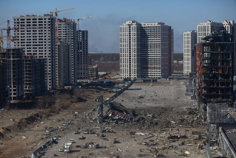FILE - A view to the site of an explosion as a result of a missile strike into the shopping mall on March 21, 2022 in Kyiv, Ukraine. As Russia's advance on Kyiv has largely stalled, the Ukrainian capital has continued to be hit by missiles and shellfire. More than three million people have fled Ukraine since Russia launched its large-scale invasion of the country on Feb. 24.
