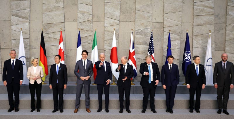 ( From L-R) NATO Secretary General Jens Stoltenberg, President of the European Commission Ursula von der Leyen, Fumio Kishida Japan's Prime Minister, Canada's Prime Minister Justin Trudeau, US President Joe Biden, German Chancellor Olaf Scholz, Britain's Prime Minister Boris Johnson, France's President Emmanuel Macron, Italy's Prime Minister Mario Draghi and European Council President Charles Michel pose for a family photo during the G7 summit in Brussels on March 24, 2022.