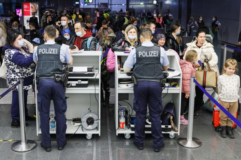 Ukrainian refugees queue at Immigration and Border Control, after arriving from Moldova at Frankfurt Airport on March 25, 2022 in Frankfurt, Germany.