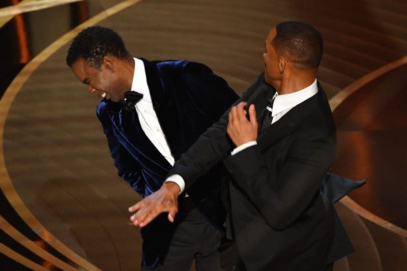 Will Smith slaps Chris Rock onstage during the 94th Oscars at the Dolby Theatre in Hollywood, California on March 27, 2022. 