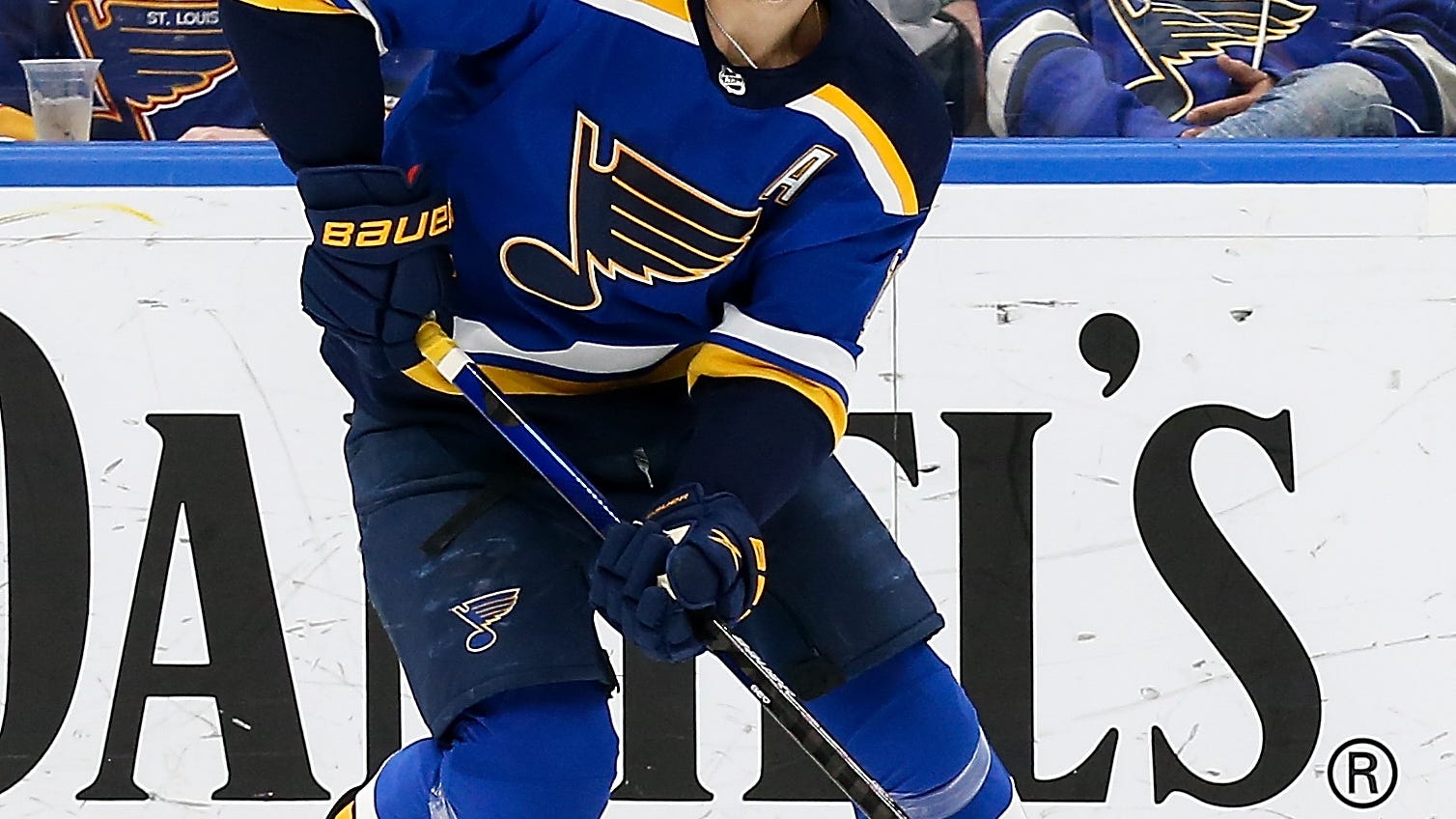 Blues edge out Wild in OT, clinch playoff spot