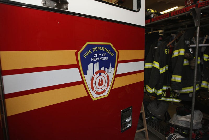 A 66-year-old woman is dead after an apartment building fire in Harlem.