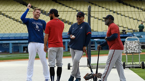 Watch: Freddie Freeman's son sprints to hug Dansby Swanson