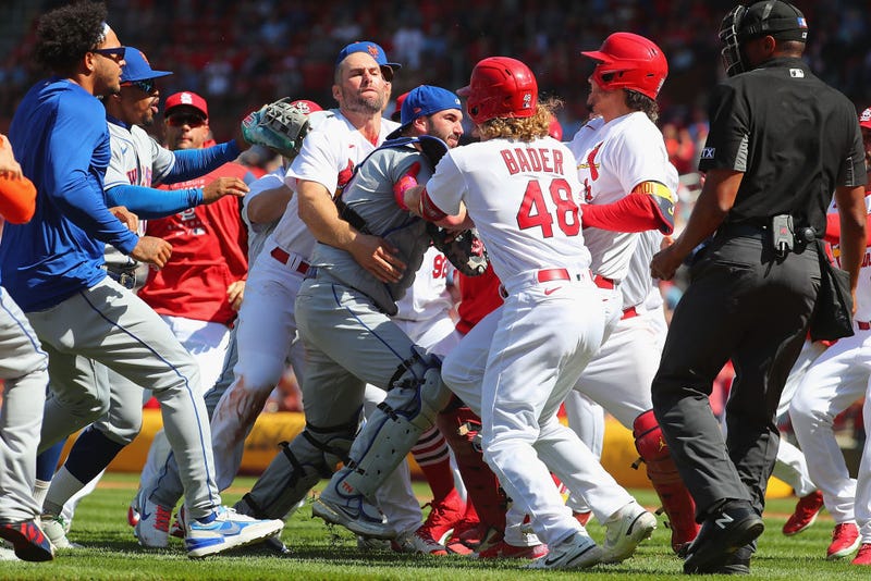 Paul Goldschmidt #46 of the St. Louis Cardinals attempts to restrain Tomas Nido #3 of the New York Mets after the benches cleared in the eighth inning at Busch Stadium on April 27, 2022 in St Louis, Missouri.