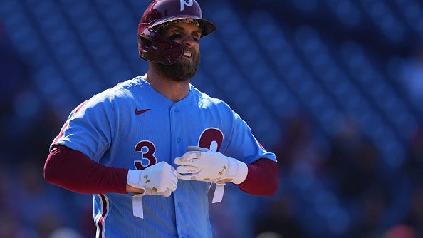 Watch: Bryce Harper convinces fan to trade hats