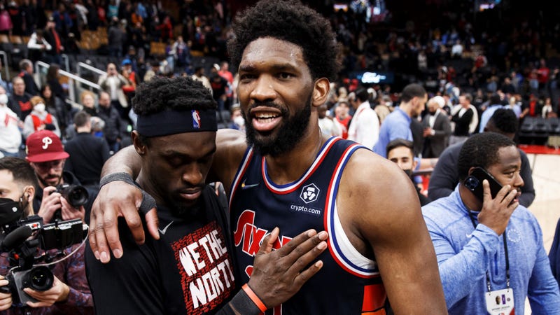 Joel Embiid of the Philadelphia 76ers and Pascal Siakam of the Toronto Raptors embrace after the 76ers' 132-97 win in Game Six of the Eastern Conference First Round at Scotiabank Arena on April 28, 2022 in Toronto, Canada.