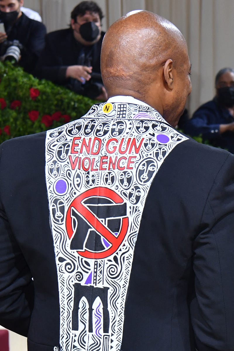 New York City Mayor Eric Adams, wearing a jacket with "End Gun Violence", arrives for the 2022 Met Gala at the Metropolitan Museum of Art on May 2, 2022, in New York. - The Gala raises money for the Metropolitan Museum of Art's Costume Institute. The Gala's 2022 theme is "In America: An Anthology of Fashion."