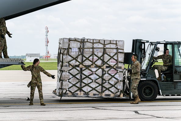 Airmen unload pallets from the cargo bay of a U.S. Air Force C-17 carrying 78,000 lbs of Nestlé Health Science Alfamino Infant and Alfamino Junior formula from Europe at Indianapolis Airport on May 22, 2022 in Indianapolis, Indiana. The mission, known as Operation Fly Formula, is being executed to address an infant formula shortage caused by the closure of the United States largest formula manufacturing plant due to safety and contamination issues. 