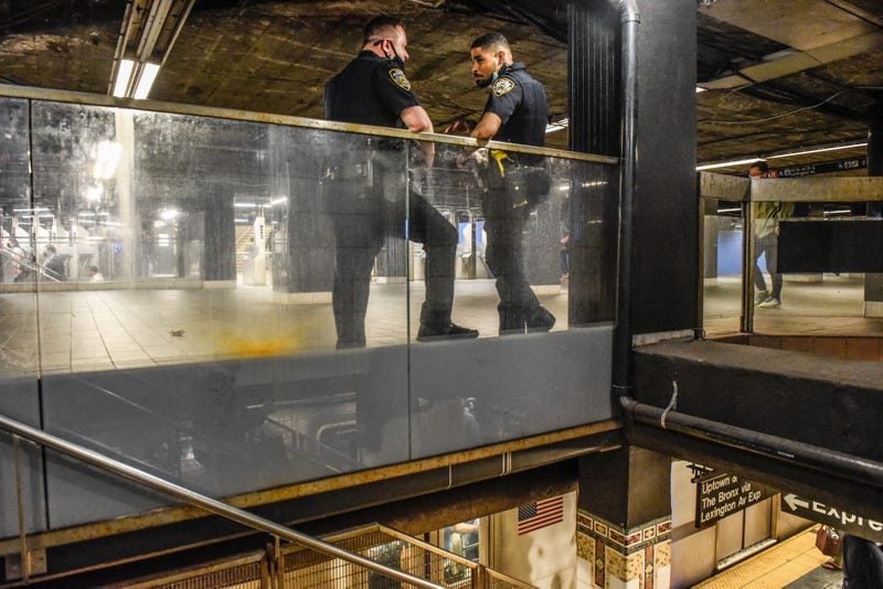 NYPD officers patrol inside the Times Square subway station on May 25, 2022