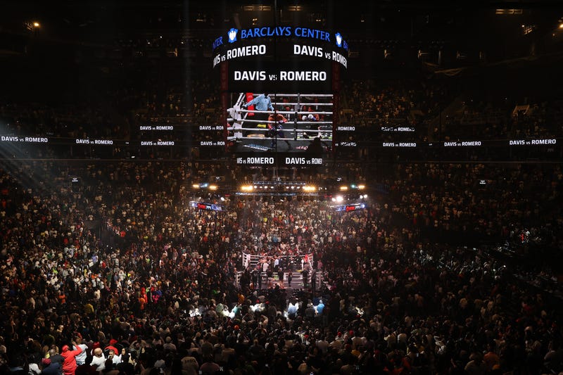 Gervanto Davis wins the fight against Rolando Romero during the WBA World Lightweight Championship at the Barclays Center just before stampede breaks out.