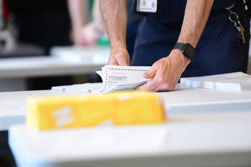 County officials perform a ballot recount on June 2, 2022, in West Chester, Pennsylvania. 