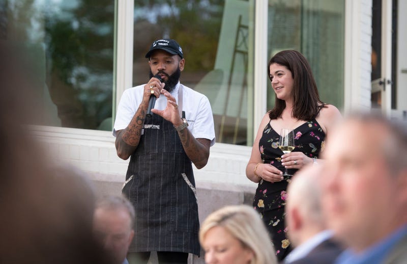 Minnesota-baed celebrity chef Justin Sutherland is charged with a felony for allegedly threatening to shoot his former girlfriend.